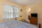 Master bedroom offers tv and ensuite full bath on main level
